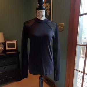 Fabletics mesh sleeved workout top.